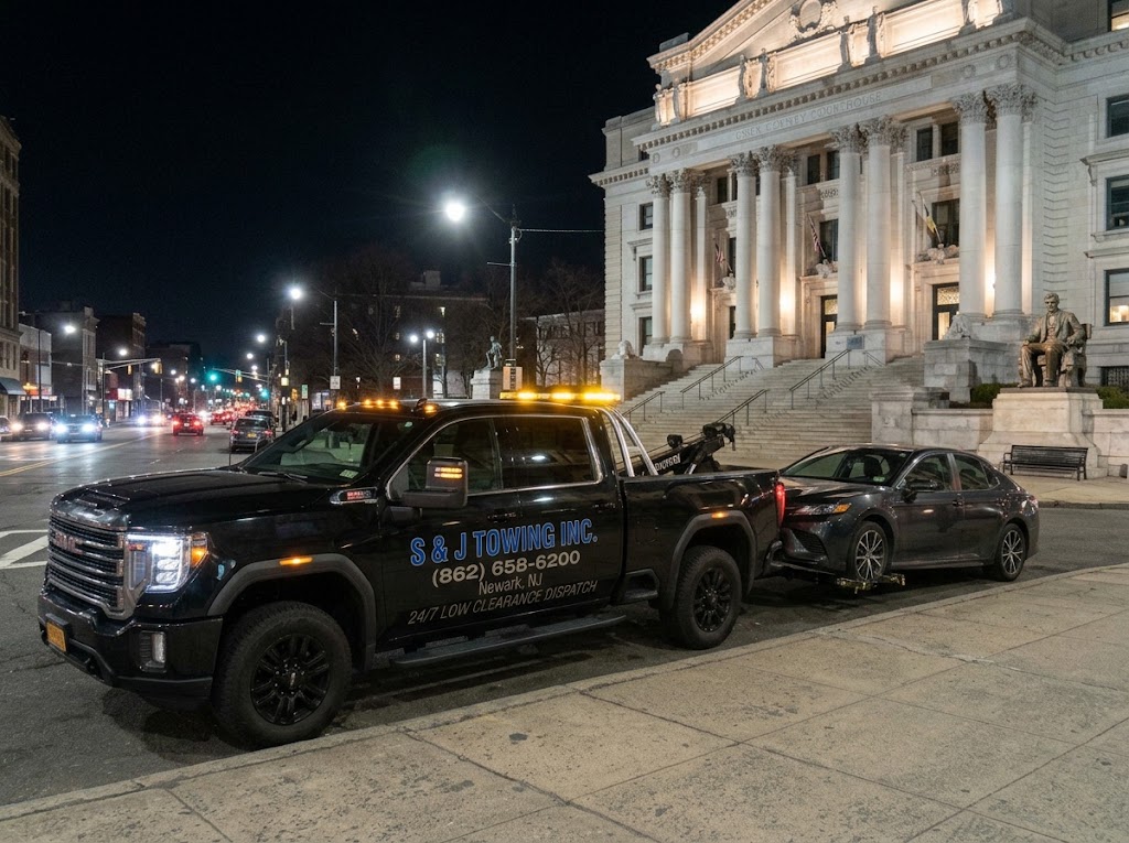 S & J Towing Truck Operating at Newark Penn Station in Essex County NJ